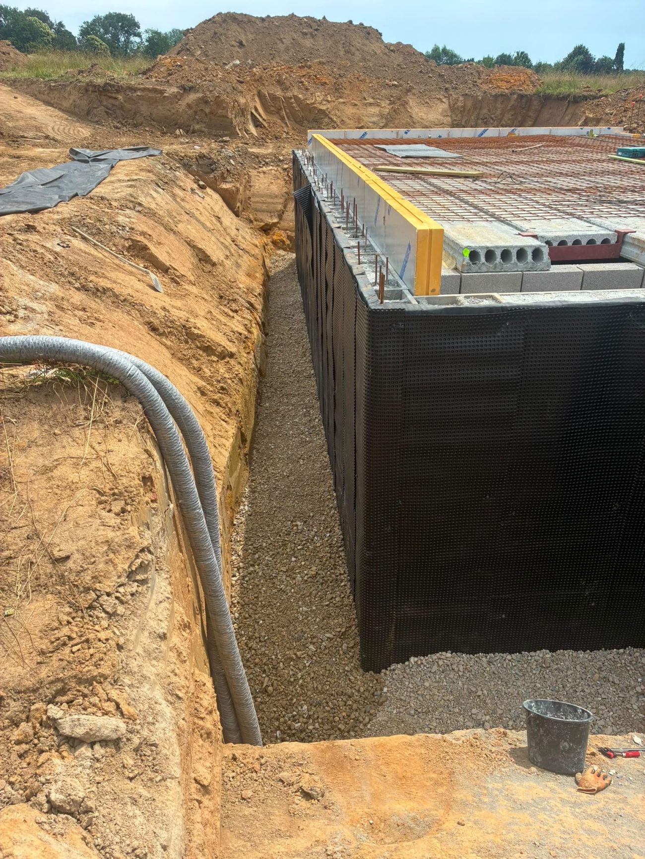 Étanchéité et drainage des parois enterrées, plancher en hourdis avant coulage